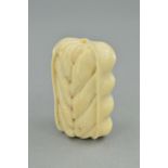 A VICTORIAN IVORY PIECE CARVED INTO THE SHAPE OF A CORN EAR