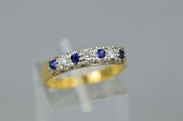 A LATE 20TH CENTURY 18CT GOLD SAPPHIRE AND DIAMOND HALF ETERNITY RING, estimated total modern