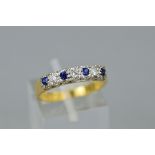 A LATE 20TH CENTURY 18CT GOLD SAPPHIRE AND DIAMOND HALF ETERNITY RING, estimated total modern