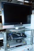 A PANASONIC 32' LCD TV, TV stand, Sky + HD box and a Panasonic DVD/video recorder (sd) (4)