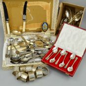 A MIXED LOT OF SILVER, to include nine silver napkin rings, approximate weight 28.8 grams, cased