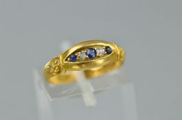 AN EARLY 20TH CENTURY SAPPHIRE AND DIAMOND GYPSY STYLE HALF HOOP RING, estimated total diamond