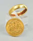 A 1913 HALF SOVEREIGN, together with a 9ct band, ring size P, approximate weight 3.0 grams