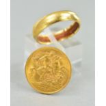 A 1913 HALF SOVEREIGN, together with a 9ct band, ring size P, approximate weight 3.0 grams