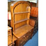 A MEDIUM OAK DUTCH DRESSER, with two drawers over two doors to base, approximate width 90cm and a