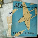 AN ACE JUNIOR STAMP ALBUM, with a quantity of loose stamps, circa 1950's