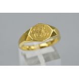 AN 18CT SIGNET RING, ring size R, approximate weight 9.9 grams