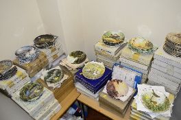 A QUANTITY OF BOXED COLLECTORS PLATES, to include eight Wedgwood 'Waterway's by Winter Moonlight',