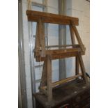 A PAIR OF 20TH CENTURY PINE TRESTLE STANDS