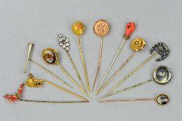A 9CT PARCEL OF TWELVE MIXED STICK PINS, a 9ct yellow metal, enamel, fox's head, horses's head, etc