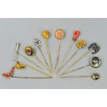 A 9CT PARCEL OF TWELVE MIXED STICK PINS, a 9ct yellow metal, enamel, fox's head, horses's head, etc