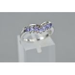 A 9CT WHITE GOLD TANZANITE RING, ring size M, approximate weight 3.5 grams (certificate)