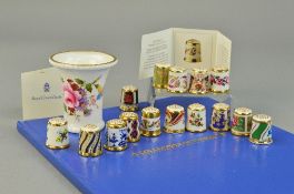 A SET OF FIFTEEN ROYAL CROWN DERBY THIMBLES, a book 'A Collection of Thimbles' and fourteen