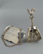 A SILVER WINE LABEL, and a silver caddy spoon, approximate weight 32.8 grams