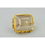 A LATE 19TH CENTURY SMOKY QUARTZ BROOCH, rectangular smoky quartz measuring approximately 19.5mm x