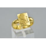 A 22CT SIGNET RING, engraved A.J.N. Interlocking), ring size Q, approximate weight 10.2 grams