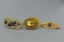 THREE EARLY 20TH CENTURY BROOCHES, to include a 15ct gold split pearl oval brooch, twist wire and