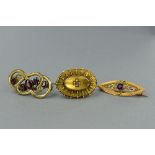 THREE EARLY 20TH CENTURY BROOCHES, to include a 15ct gold split pearl oval brooch, twist wire and