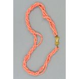 A CORAL TRIPLE ROW TWIST NECKLACE, pale pink coral beads, each round bead measuring approximately