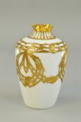 A ROSENTHAL BUD VASE, applied gilt decoration on white ground, approximate height 12cm