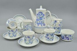 A TURI DESIGN SIX PLACE TEASET IN THE 'LOTTE' PATTERN, consisting cups, saucers, teapot, milk jug
