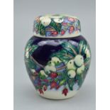 A MOORCROFT 'SNOWBERRY' PATTERN GINGER JAR AND COVER, with impressed Moorcroft backstamp, designer