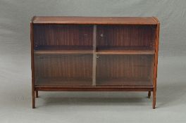 A 1970'S DANISH STYLE TEAK BOOKCASE, with double glazed sliding doors, on 'A' shaped legs,