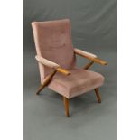 A SCANDINAVIAN STYLE OAK FRAMED RECLINING ARMCHAIR, the cylindrical tapering support holding