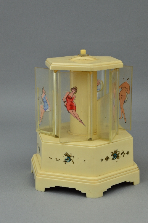 A BAKELITE NOVELTY SELCO MUSICAL CIGARETTE DISPENSER, the compartments decorated with ladies, the - Image 3 of 6
