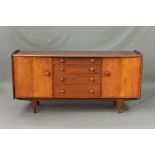 JOHN HERBERT, a Younger Volnay 1960's teak sideboard, flanked by four graduating drawers, central to