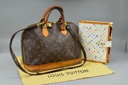 LOUIS VUITTON, 'Alma', handbag with a brown coated canvas body with leather handles and bottom, also