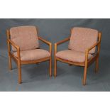 A PAIR OF LATE 20TH CENTURY ERCOL BEECH POSTURE ARMCHAIRS, (2)