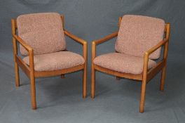 A PAIR OF LATE 20TH CENTURY ERCOL BEECH POSTURE ARMCHAIRS, (2)