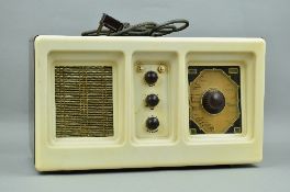 A VINTAGE RADIO RENTALS, LONDON, model RR57, cream and brown bakelite radio, approximate size
