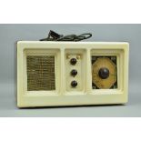 A VINTAGE RADIO RENTALS, LONDON, model RR57, cream and brown bakelite radio, approximate size