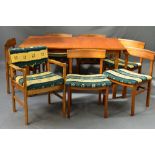 A GORDON RUSSELL OF BROADWAY TEAK RECTANGULAR EXTENDING DINING TABLE, on square block legs, with