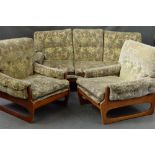 A CINTIQUE TEAK THREE PIECE LOUNGE SUITE, the frame with saddle arms to a shaped 'O' frame legs,