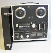 AN AKAI 1721L FOUR TRACK STEREOPHONIC REEL TO REEL RECORDER, with lid (untested)