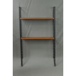 A LADDERAX TEAK BOOKCASE, formed with two metal laddered uprights and two shelves, approximate