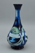 A MOORCROFT 'KNYPERSLEY' PATTERN BALUSTER SHAPED VASE, designed by Emma Bossons, with initials,