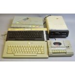 AN ATARI 600XL, AN ATARI XE, an Atari keyboard, an Atari 1050 floppy drive, an Atari XC12 datassette
