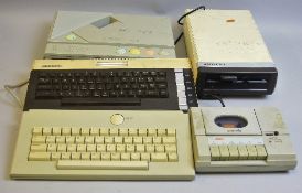 AN ATARI 600XL, AN ATARI XE, an Atari keyboard, an Atari 1050 floppy drive, an Atari XC12 datassette