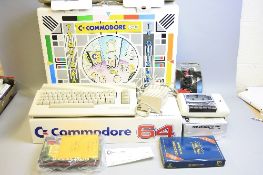 A BOXED COMMODORE 64C VIDEO PACK VINTAGE PERSONAL COMPUTER, with original packaging, power supply, a
