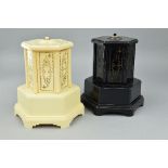 A PAIR OF SELCO BAKLITE NOVELTY MUSICAL CIGARETTE DISPENSERS, one in cream, the other in black,