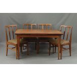 JOHN HERBERT, a Younger Volnay 1960's teak draw-leaf table on tapering legs, approximate size