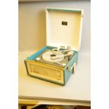 A DANSETTE BERMUDA RECORD PLAYER, in grey and teal green fitted with a Monarch turntable, inspection