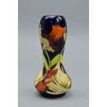 A MOORCROFT 'PARASOL DANCE' GOURD SHAPED VASE, designed by Kerry Goodwin, it bares the Moorcroft