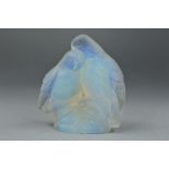 A JOBLINGS OPALIQUE GLASS ORNAMENT OF A PAIR OF BIRDS ON A BRANCH, moulded in opalescent glass