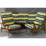 GUY RODGERS NEW YOKER, a 1960's teak framed three piece suite, with removable cushions, comprising