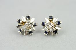 A PAIR OF LATE 20TH CENTURY 9CT WHITE GOLD SAPPHIRE AND DIAMOND ROUND CLUSTER STUD EARRINGS, the